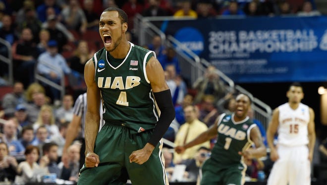UAB Blazers guard Robert Brown (4) reacts after the UAB Blazers defeat the Iowa State Cyclones 60-59 in the second round of the 2015 NCAA Tournament at KFC Yum! Center.