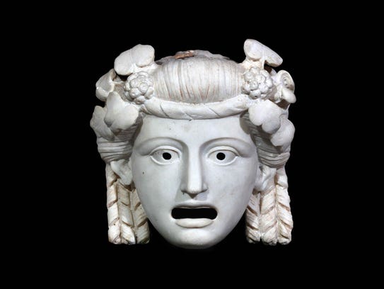 A theater mask that was discovered in the ancient city
