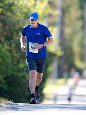 New Paltz’s Dennis Moore is shown running in this file photo.