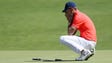Jordan Spieth of the United States reacts to a misesd