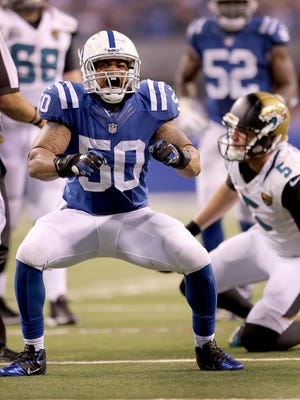 The Indianapolis Colts play the Jacksonville Jaguars Sunday, November 23, 2014, afternoon at Lucas Oil Stadium. Indianapolis Colts inside linebacker Jerrell Freeman (50) celebrates a sacks on Jacksonville Jaguars quarterback Blake Bortles (5) in the second half. 