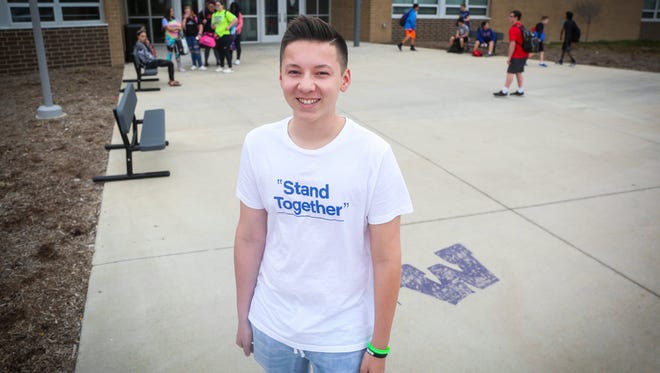 Michael Mitchell stands outside Timberline School in Waukee, where students will join a nationwide walkout later this month. Mitchell has been instrumental in organizing the walkout, and said he's doing it because he feels more needs to be done about mass shootings in United States schools.