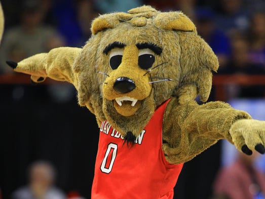 The Davidson Wildcats mascot performs in the first