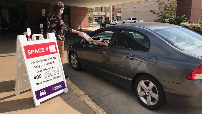 As a way to maintain social distancing the Shawnee Public Library now offers curbside pick up for patrons to pick up their books, movies and other items.