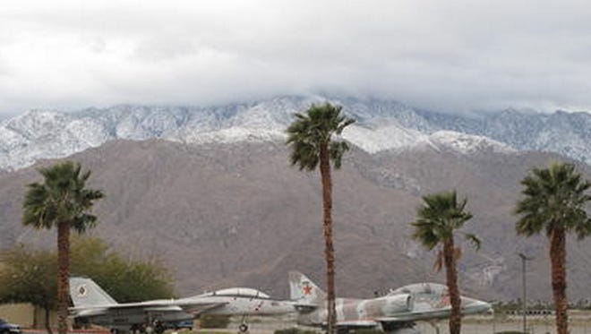 Snow is seen in mountains surrounding the Coachella Valley on Thursday morning, Feb. 16, 2012