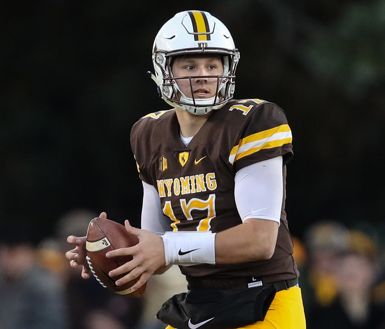 Wyoming Cowboys quarterback Josh Allen (17) looks to throw against the New Mexico Lobos during the first quarter at War Memorial Stadium.