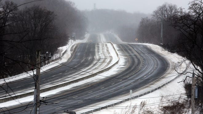 The New York State Thruway in Ardsley all but empty of traffic Jan. 27, 2015. Despite lower than projected snowfall, most drivers stayed off the roads during the morning hours.