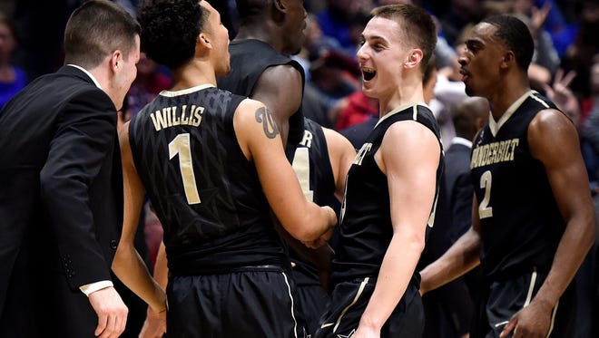 Vanderbilt Commodores guard Payton Willis (1) and guard Riley LaChance (13) react after they defeated Florida in a 2017 SEC Men's Basketball Tournament game at Bridgestone Arena Friday, March 10, 2017 in Nashville, Tenn.