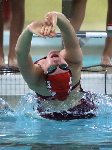 Wauwatosa East's Ingrid Meulemans swims the backstroke
