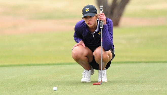 Wylie's Maddi Olson lines up a putt during the final round of the District 5-4A tournament at the Sweetwater Country Club on Monday, April 9, 2018. Olson and the Lady Bulldogs won district titles.