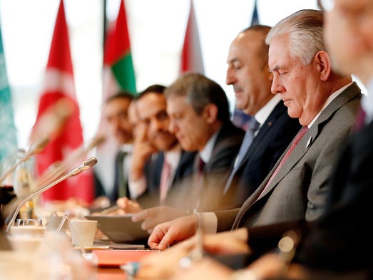 Tillerson attends the Foreign Ministers Meeting for