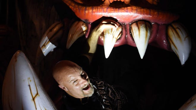 Owner Ed Terebus in the jaws of a monster at Erebus in Pontiac in 2016.