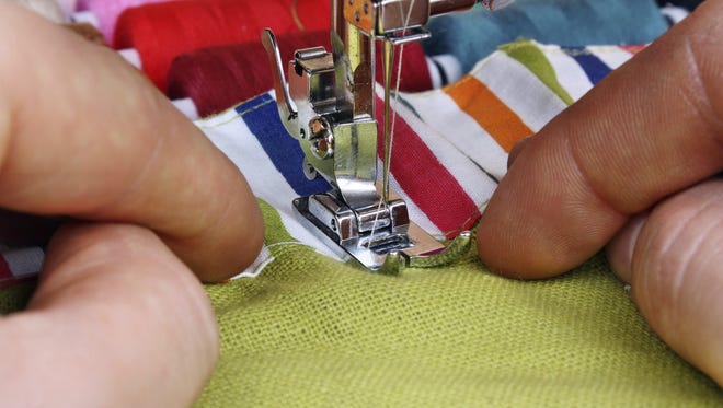 Hand sewing on a machine