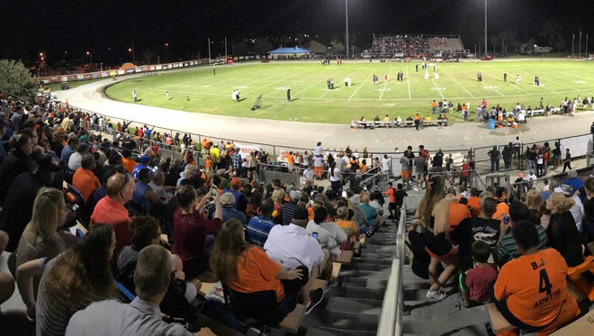 The stands are full of fans during a game between Cocoa and Jones.