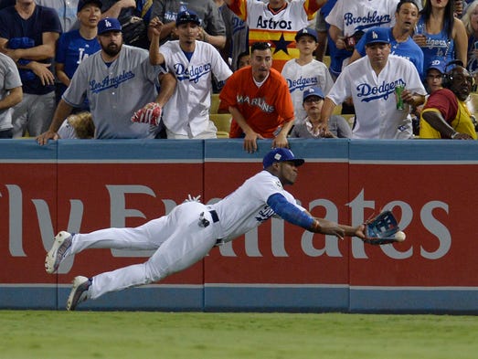 Game 2 at Dodger Stadium: Yasiel Puig dives but can't