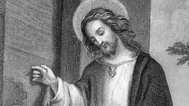 A wood carving of Jesus Christ.