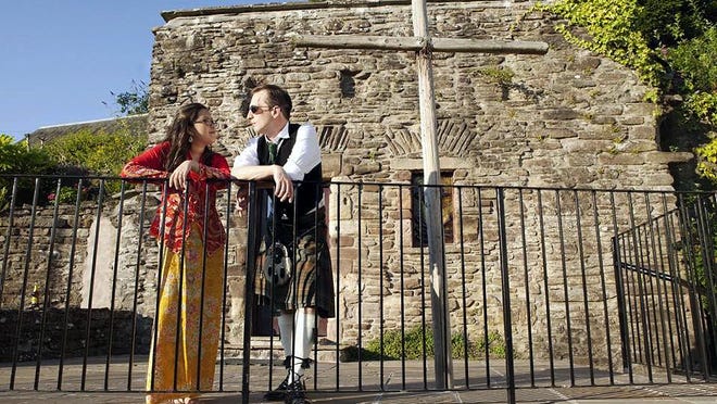 Han, left, and Calum Stuart wear traditional clothing from their native countries for their wedding reception in Dunblane, Scotland. Her gown is a Singaporean kebaya and his kilt is worn to honor his Scottish heritage. Rather than choose between a traditional wedding or a modern one, many couples are finding unique ways to infuse family history and tradition into celebrations.