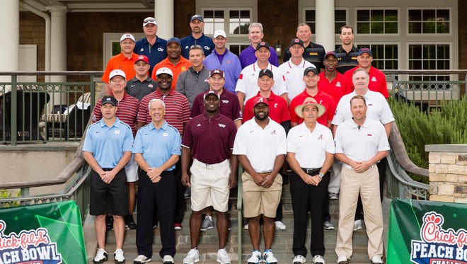 From left to right (top down): Paul Johnson, Jon Barry (Georgia Tech), Gus Malzahn, Bo Jackson (Auburn), Dabo Swinney, Steve Fuller (Clemson), Randy Edsall, Scott McBrien (Maryland), Urban Meyer, Jeff Long (Ohio State), Dave Doeren, Terry Harvey (N.C. State), Rich Rodriguez, Kenny Lofton (Arizona), Steve Spurrier, Sterling Sharpe (South Carolina),  Dan Mullen (Mississippi State), Tommy Tuberville, Kevin Huber (Cincinnati), Sean Tuohy (Ole Miss), Larry Fedora, Roy Williams (North Carolina), Fred McCrary (Mississippi State), Mark Ingram, Nick Saban (Alabama) and Hugh Freeze (Ole Miss) pose for their coaches photo during the 2015 Chick-fil-A Peach Bowl Challenge on the Oconee Golf Course at Reynolds Plantation on Tuesday, April 28, 2015. (Chick-fil-A Peach Bowl/Abell Images/Paul Abell)
