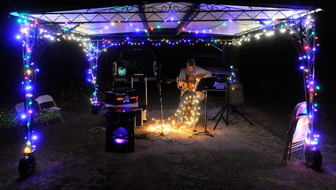 John Kirby plays Christmas songs Dec. 16, 2017 during the Greenleaf Cemetery Holiday Trail of Lights in Brownwood. Volunteers held the fundraiser for two weekends this month to assist in the maintenance of the perpetual-care cemetery.