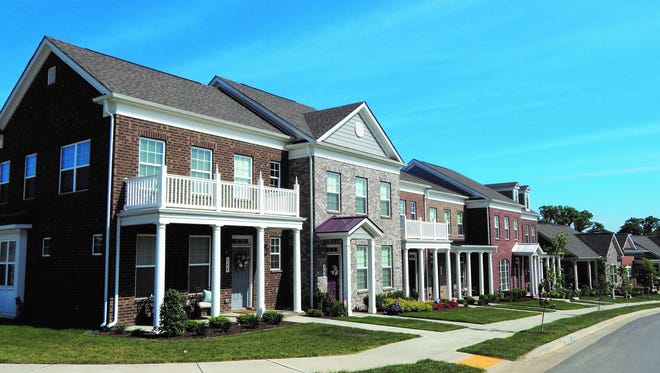 A rendering shows townhomes planned at Burkitt Ridge.