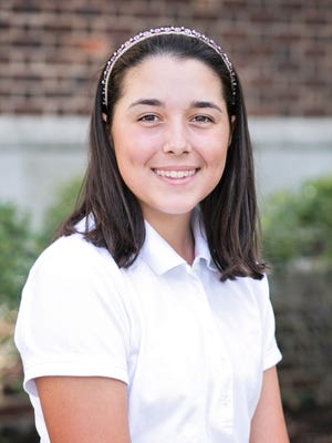 Tower Hill eighth-grader Phoebe Brinker shot a 69 Tuesday to build a three-stroke lead in the DIAA Golf Tournament.