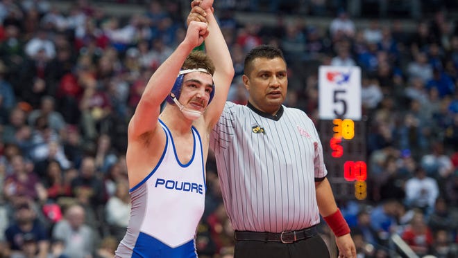 Poudre wrestler Jacob Greenwood celebrates winning his 138-pound title match against KJ Kearns of Coronado during the CHSAA State Championships at the Pepsi Center in Denver on Saturday. The win is Greenwood's third state title.