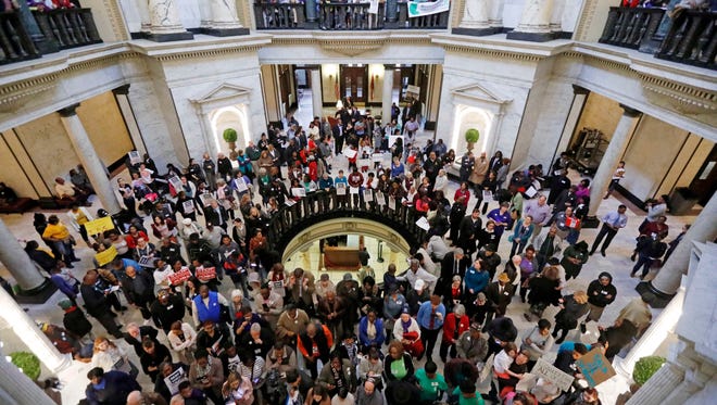 Several hundred parents, educators, education activists and students join a handful of legislators in an education rally at the Capitol in Jackson on Thursday. Advocates for public schools are opposing legislative leaders' plans to rewrite the state's school funding formula.