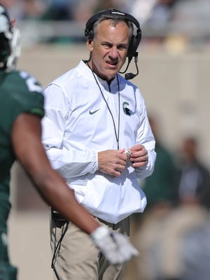 Michigan State head coach Mark Dantonio watches the action during the spring game at Spartan Stadium, Saturday, April 1, 2017.