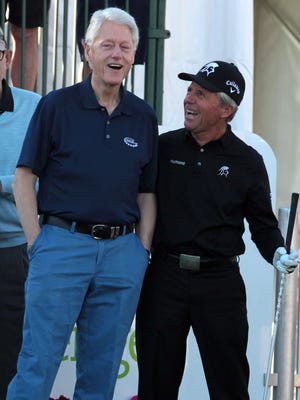 Former President Bill Clinton and golf legend Gary Player chat before the start of the first round of the 2014 Humana Challenge at PGA West in January in La Quinta.