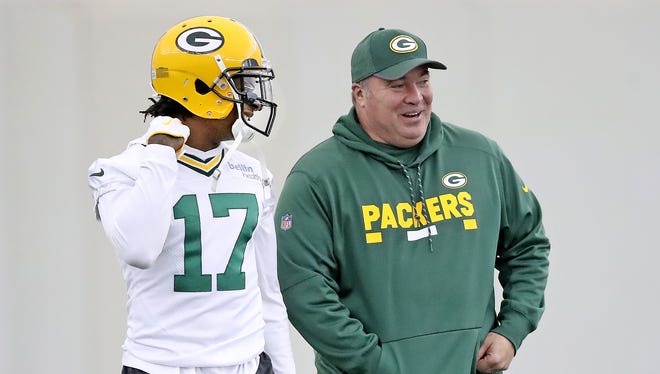Green Bay Packers wide receiver Davante Adams (17) laughs along with coach Mike McCarthy during practice Tuesday, October 31, 2017 in the Don Hutson Cente.