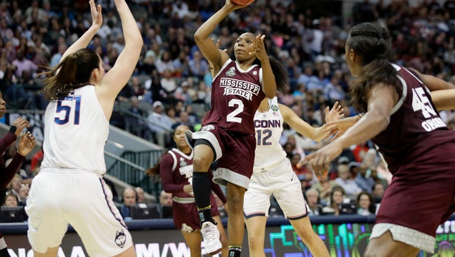 Mississippi State guard Morgan William (2) drives to the basket as Connecticut center Natalie Butler (51) defends during the first half of an NCAA college basketball game in the semifinals of the women's Final Four, Friday, March 31, 2017, Friday, March 31, 2017, in Dallas. (AP Photo/LM Otero)