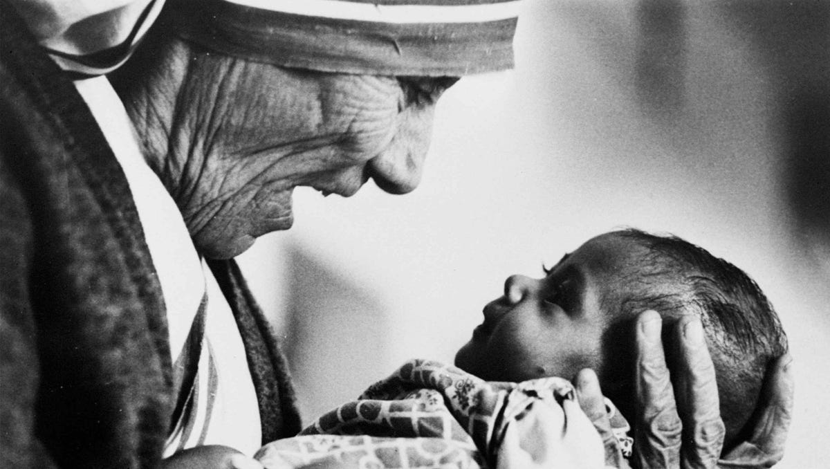Mother Teresa, cradles a baby in a this 1979 file photo.