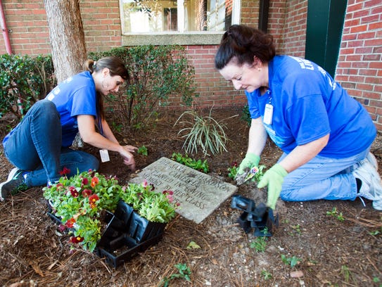 Florida Blue employees, Christine Burgos, left, and