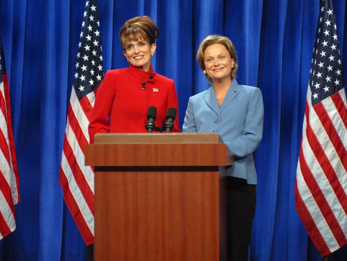 Tina Fey portrays Alaska Gov. Sarah Palin, left, and