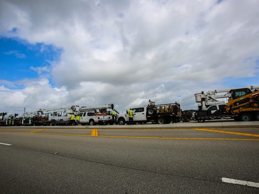Emergency crews line up in Golden Gate Estates Monday,