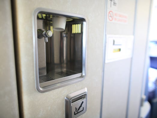 A water dispenser, relic of an earlier time, waits