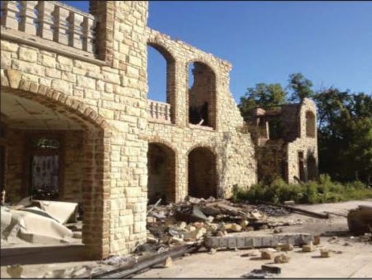 Mystery fire at Indian Hill mansion off to court with millions on line