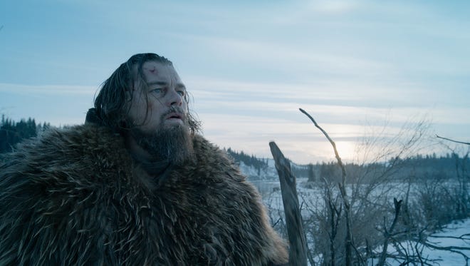 This photo provided by courtesy of  Twentieth Century Fox shows, Leonardo DiCaprio as Hugh Glass, in a scene from the film, "The Revenant," directed by Alejandro Gonzalez Inarritu. The movie opens in limited release on Dec. 25, 2015, and wider release in U.S. theaters on Jan. 8, 2016. (Courtesy Twentieth Century Fox via AP)