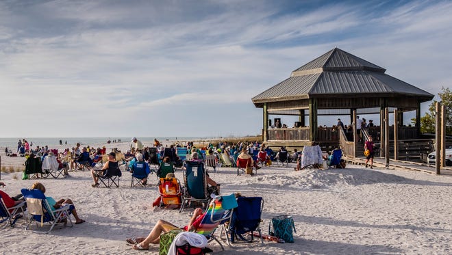 Should you face your beach chair toward the musicians or toward the sunset when you attend the Songwriters at Sunset acoustic concert series taking place at Lovers Key the first Thursday of December through April? Both options are appealing.
