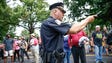 A Charlottesville police officer breaks up a fight