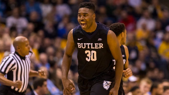 Butler Bulldogs forward Kelan Martin (30) reacts after scoring during the first half against the Marquette Golden Eagles at BMO Harris Bradley Center.