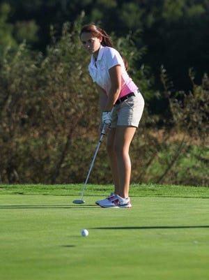 Zoey Nichols putts at the Great Hope Golf Course during her sophomore season.