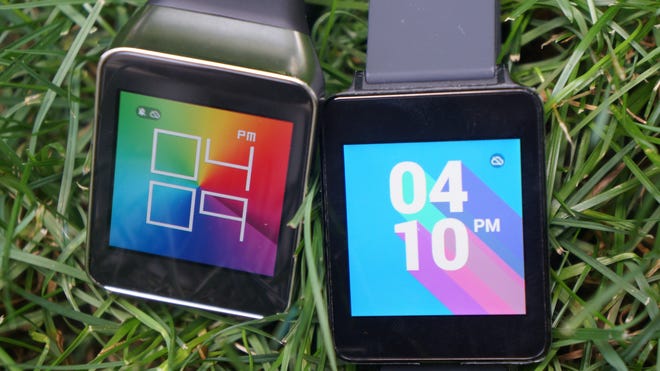 The Samsung Gear Live, left, and LG G smart watches.