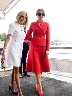 Melania wore a red Dior skirt suit for the first day