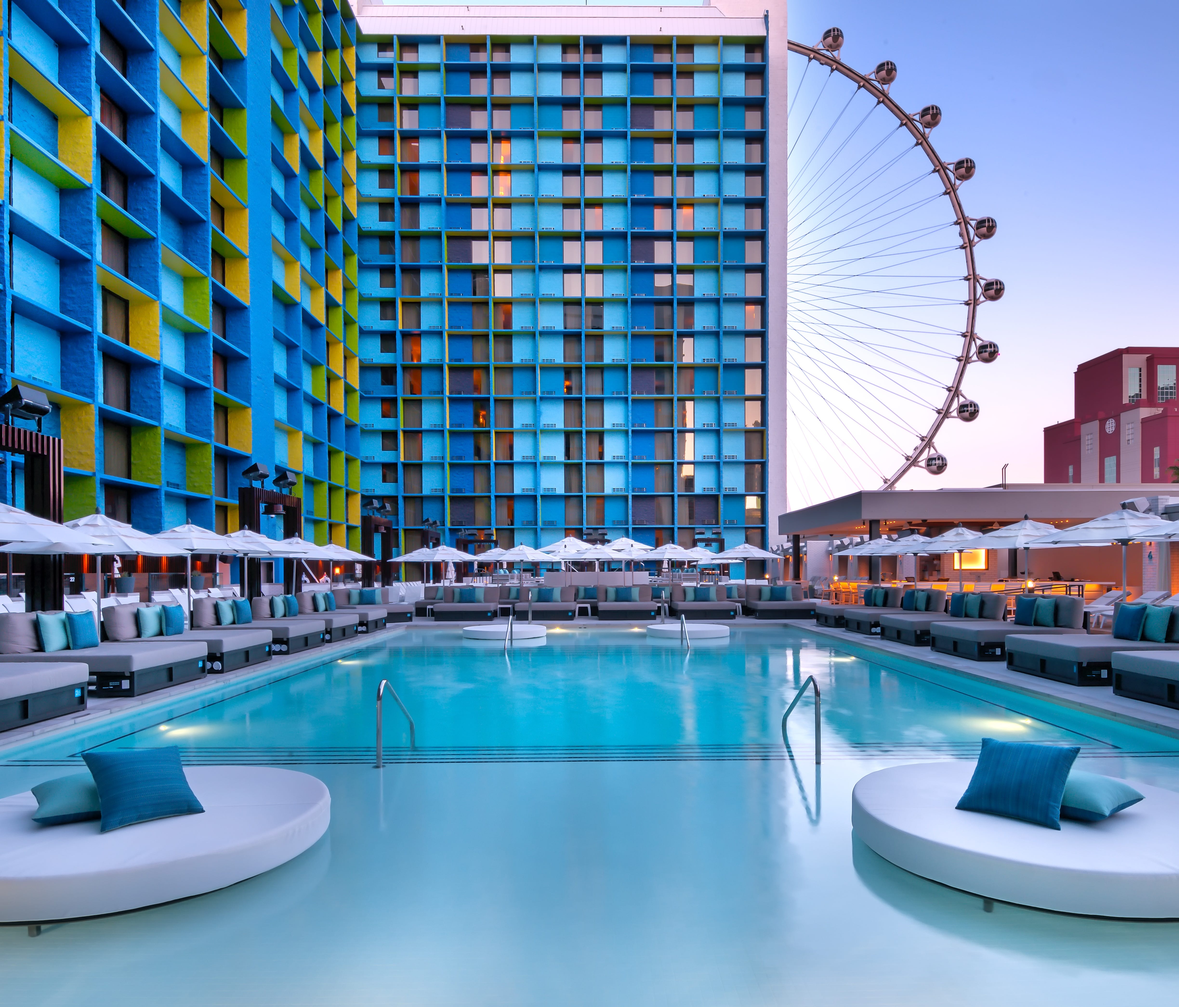 The LINQ Pool deck hosts two pools, 35 daybeds, 24 cabanas, a bar, TVs and lily pad daybeds for rent. The pool is free and exclusive to hotel guests.