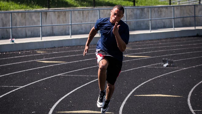 Central's Eliseus Young works on his acceleration while preparing for state at Central Thursday, June 1, 2017.  
