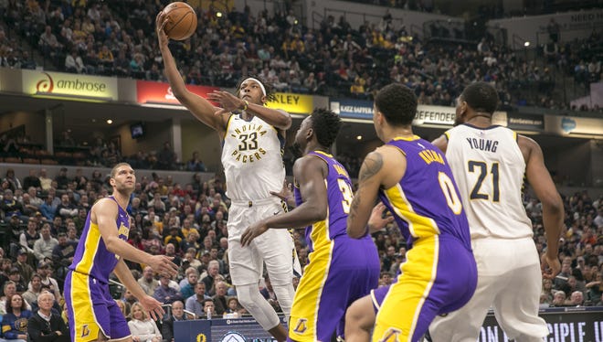 Myles Turner, back from an injured ankle, puts up a shot for Indiana, Los Angeles Lakers at Indiana Pacers, Bankers Life Fieldhouse, Indianapolis, Monday, March 19, 2018.