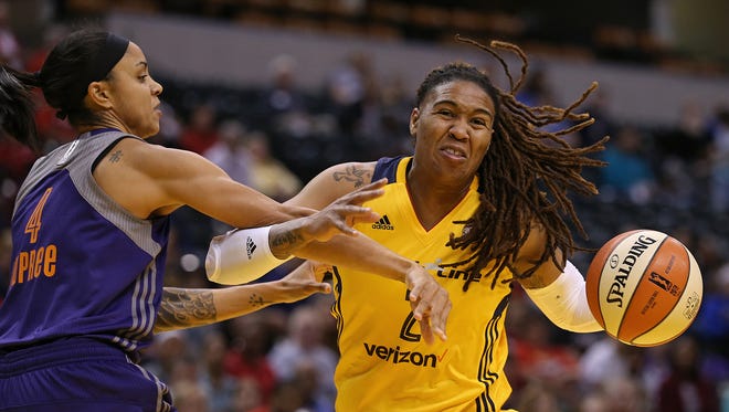 Phoenix Mercury forward Candice Dupree (4) fouls Indiana Fever forward Erlana Larkins (2) in the first quarter during an Indiana Fever game against Phoenix Mercury, Banker's Life Fieldhouse, Indianapolis, Wednesday, May 18, 2016.