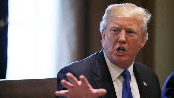 President Trump presides over a meeting about immigration