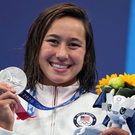 Erica Sullivan of the United States poses with silver medal for the women's 1500-meters freestyle final at the 2020 Summer Olympics, Wednesday, July 28, 2021, in Tokyo, Japan. (AP Photo/Matthias Schrader)